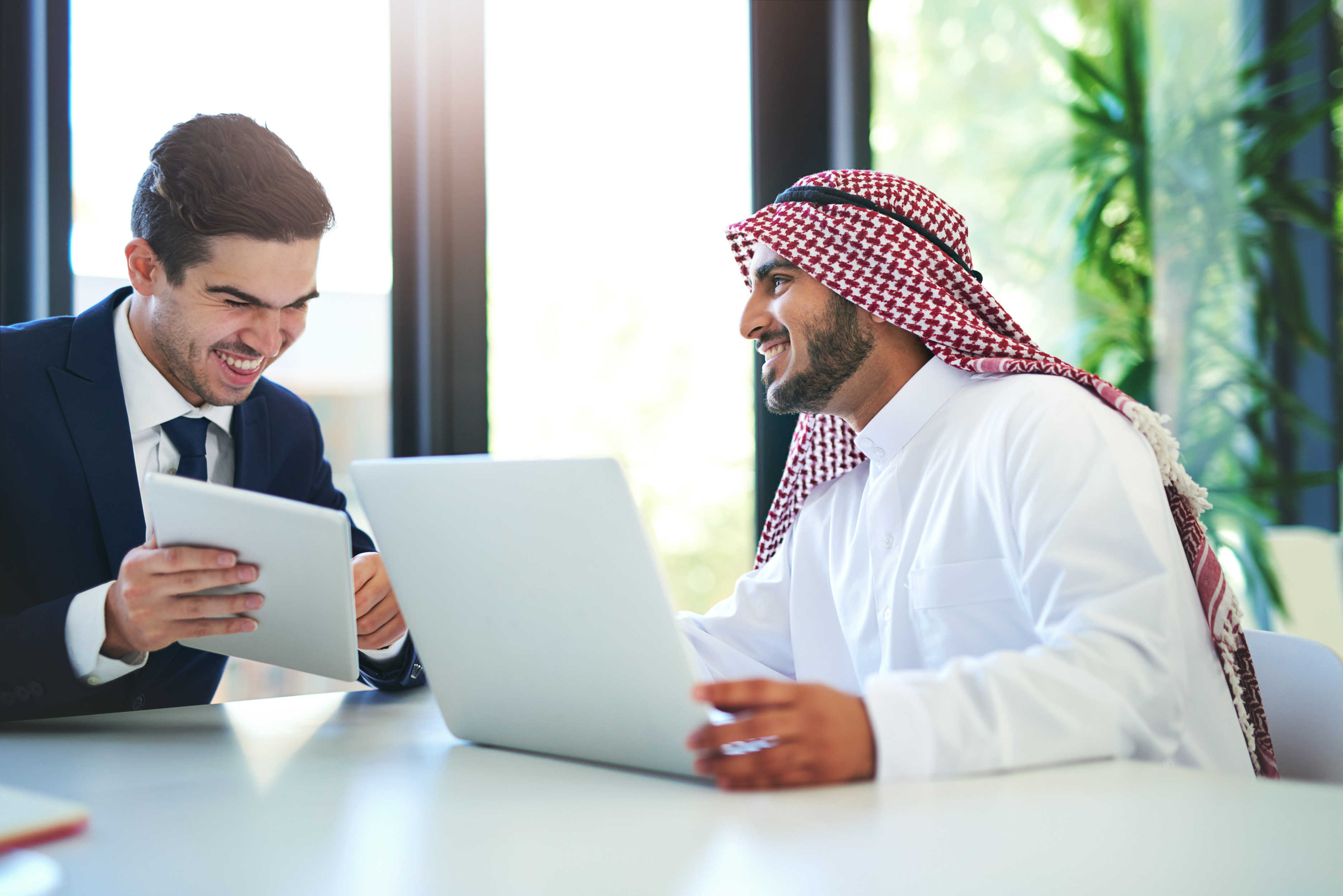 PACT recruitment specialists discussing a candidate shortlist in Dubai